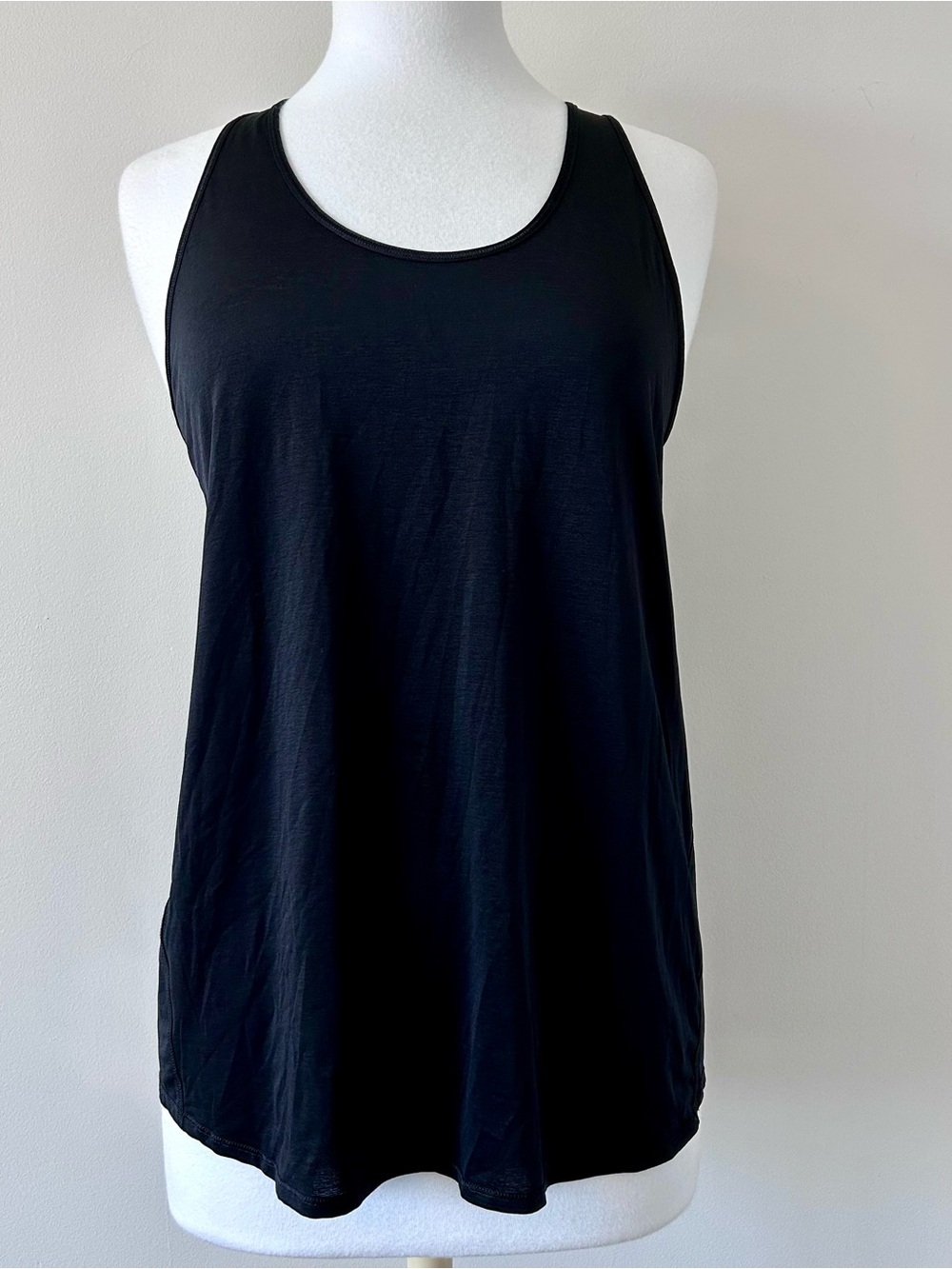 Lululemon size 8 Essential Tank Pleated Racerback Top. Color black
